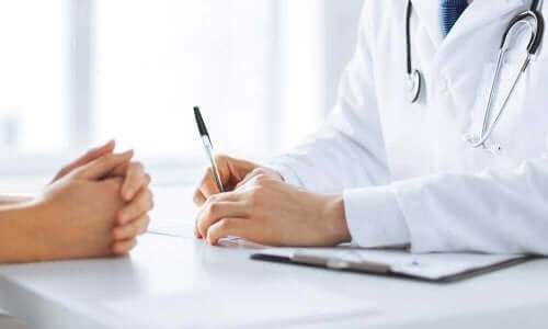 A doctor and patient.