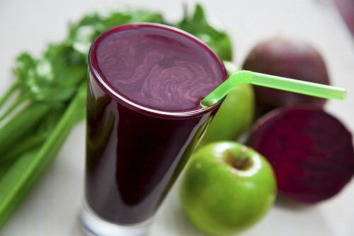Juice with apples, beets, and celery