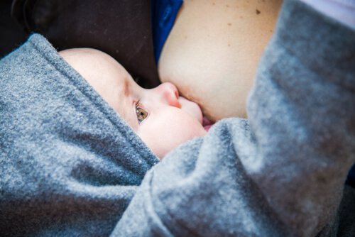 Mother breastfeeding her baby