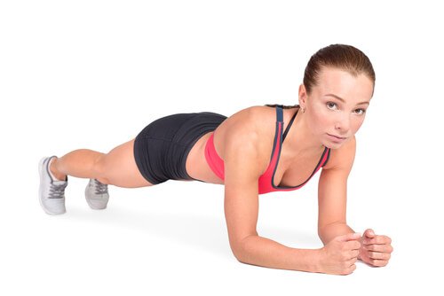 Woman doing plank lose belly fat