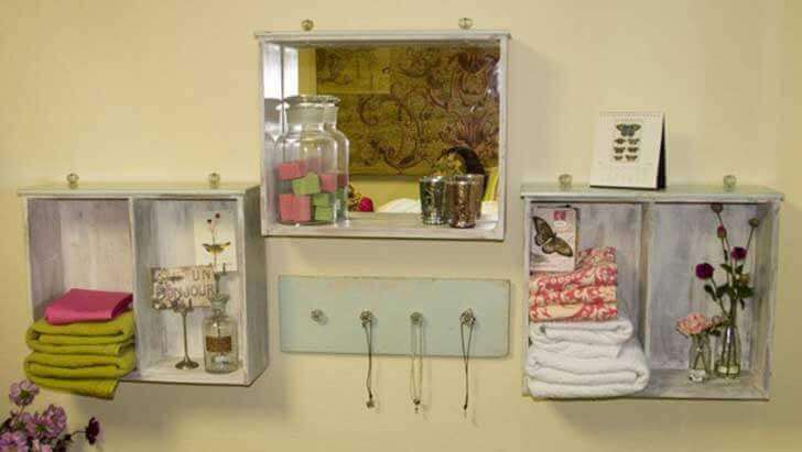 A mirror and shelf made from crates.