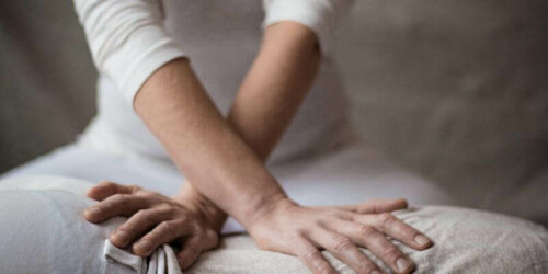 A person doing shiatsu.