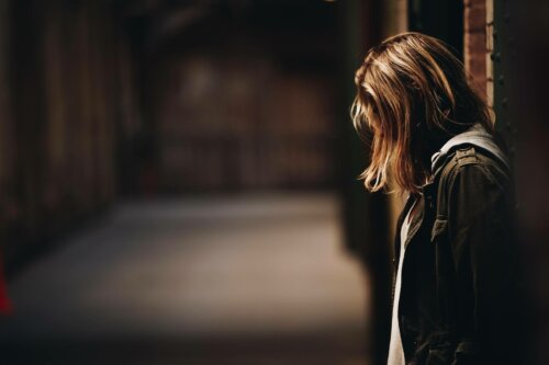 A woman looking down.