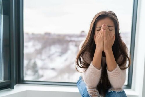 A woman that's thinking about eliminating stress.