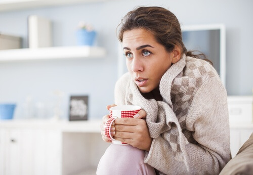 A woman feeling cold.