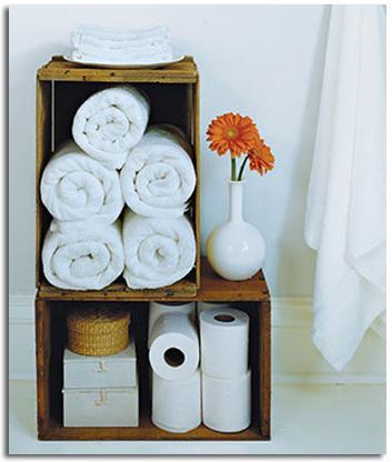Crates as bathroom organizers.