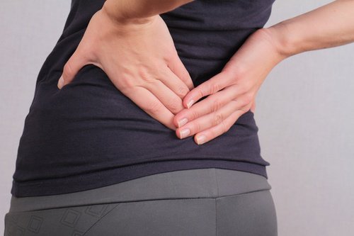 Woman with lower back pain