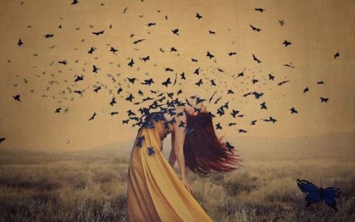 A woman with butterflies