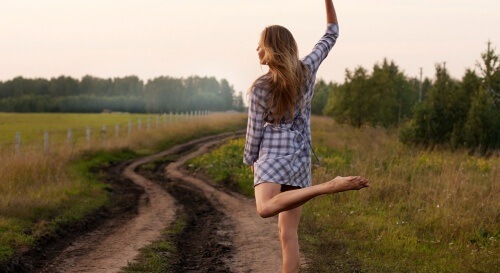 A woman dancing and walking.