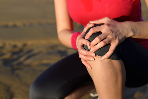 A woman with knee pain.