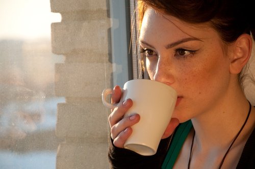 Woman drinking a cup of tea
