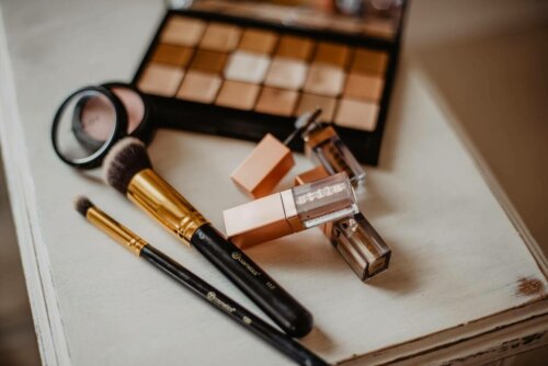 Some brown makeup to hide droopy eyelids.