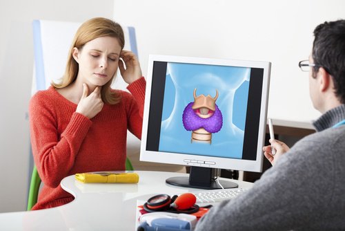 Woman at the doctor's office for thyroid pain