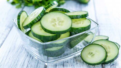 Some sliced cucumbers in a bowl.
