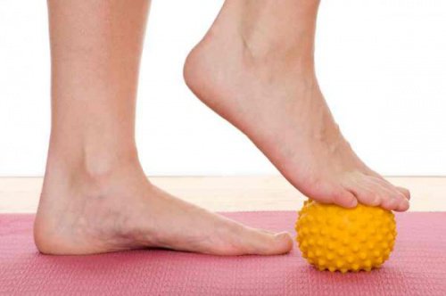 Feet exercises with a rolling ball