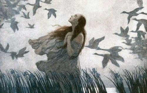 A woman surrounded by birds.