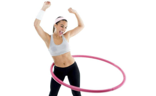 A woman excited about her hula hoop.