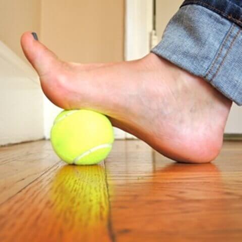 How to Use a Tennis Ball to Calm Plantar Fasciitis Pain - Step To Health