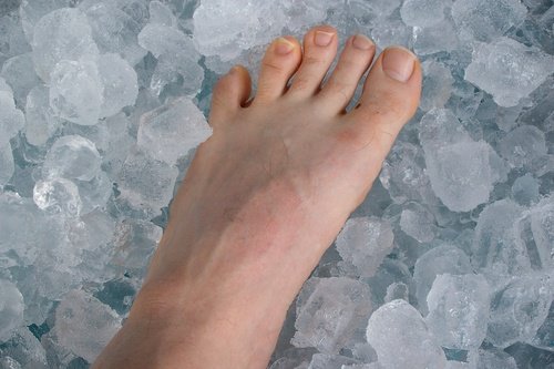 Bare foot on ice