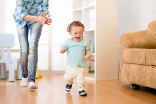 A happy baby running in the living room.