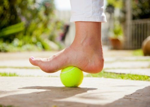 tennis ball under foot