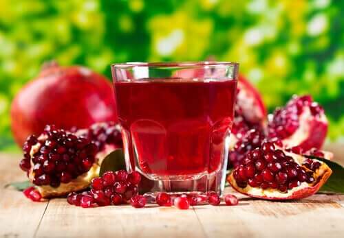 A glass of pomegranate juice.