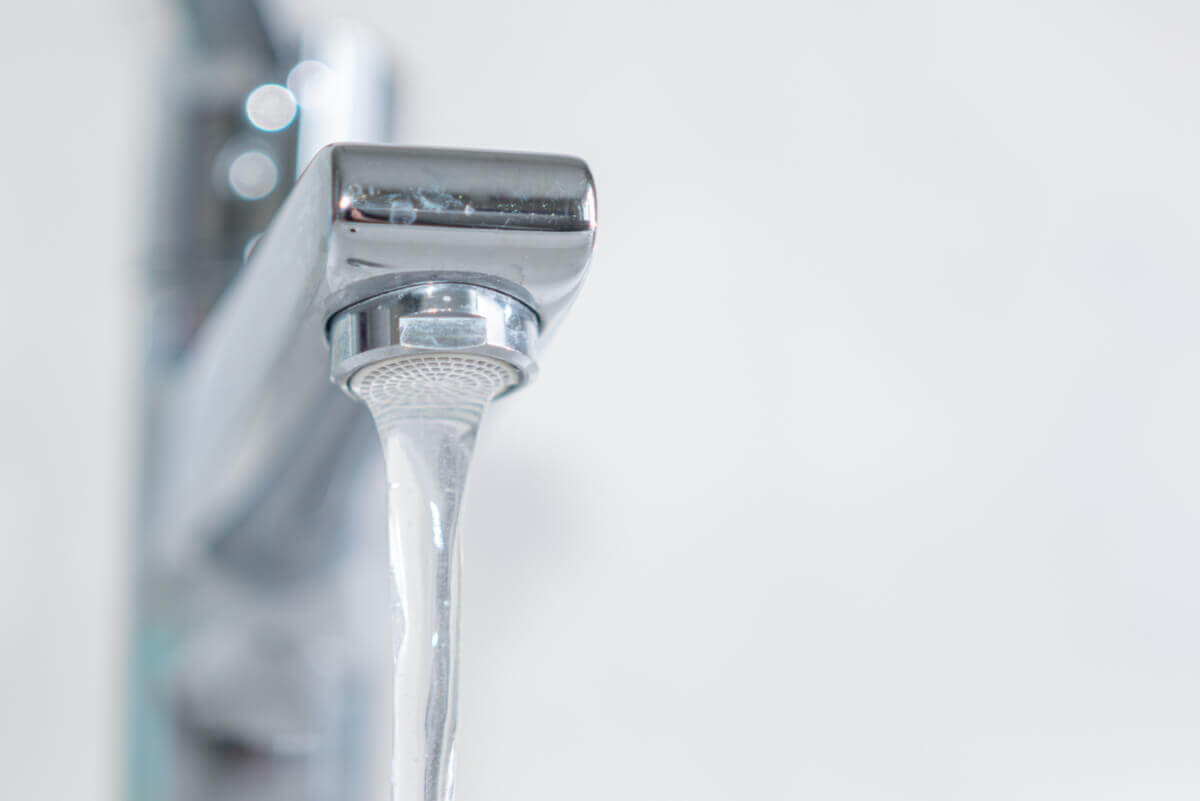 A shiny bathroom faucet.
