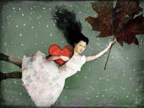 A girl flying with a leaf.