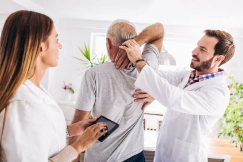A doctor evaluating a patient.