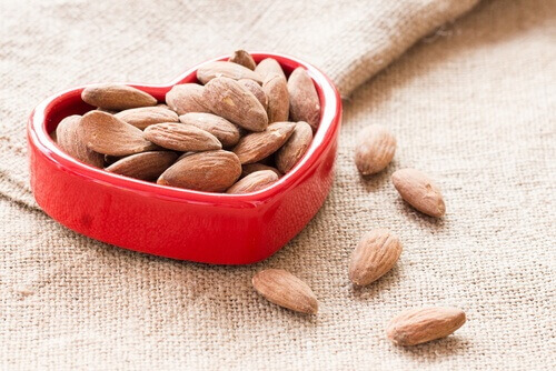Eat more nuts such as almonds which help improve heart health