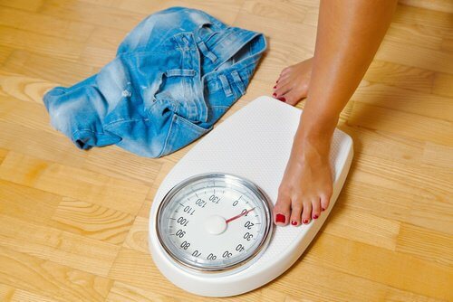 A woman on a scale.