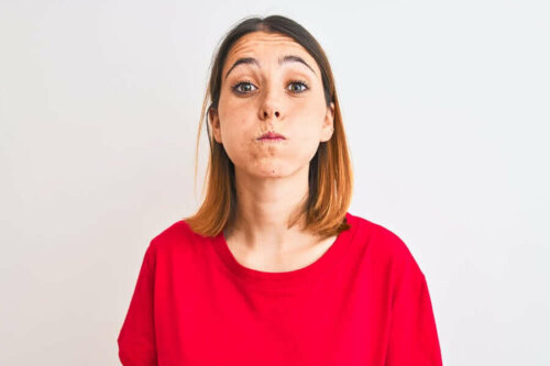 A woman holding her breath.