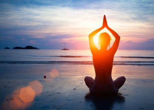 Woman doing yoga to prevent broken heart syndrome