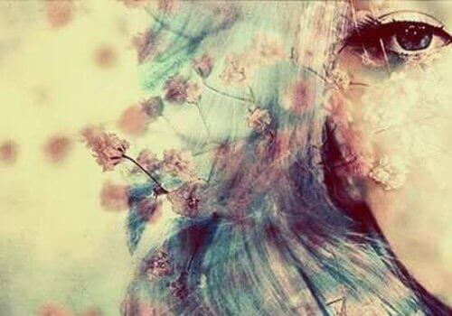 Illustration of woman's eye and pink flowers feel alone