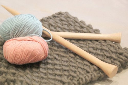 Knitting needles and wool.