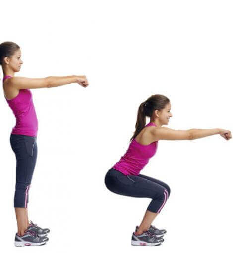 Woman doing squats.