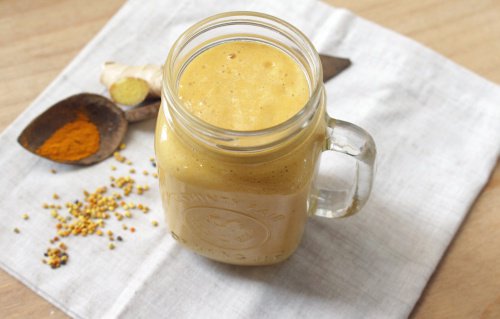 A glass of turmeric juice.