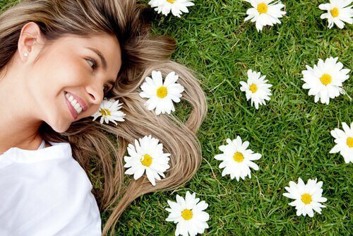 woman in daisy field