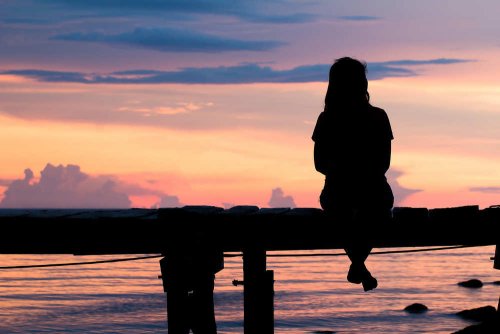Woman in the sunset