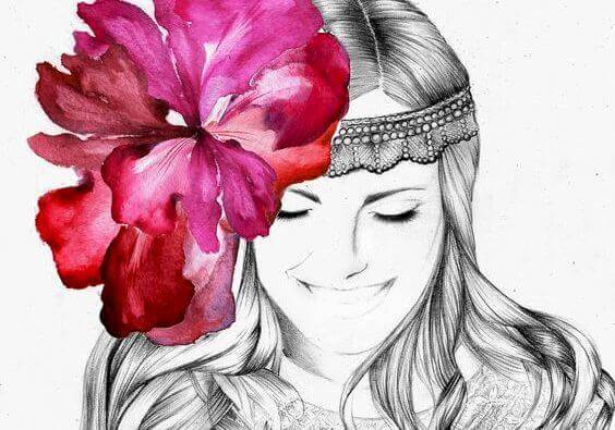 Woman with a flower on her hair smiling