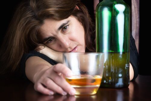 A woman drinking too much.