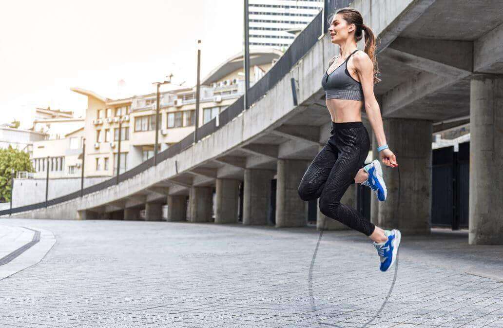 A woman jumping rope.