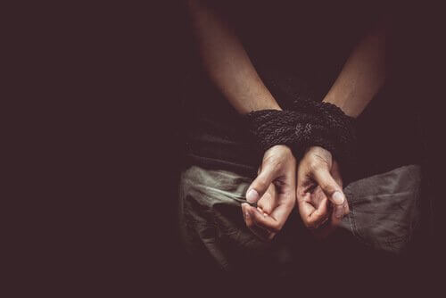 hands-tied-by-chords