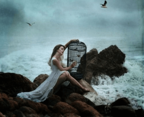 woman-cage-ocean