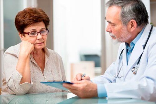 A woman talking to her doctor.