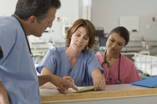 Doctors and nurses talking about bone marrow donations