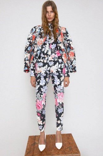 Woman wearing loose fitting outfit with floral patterns all over fashion mistakes