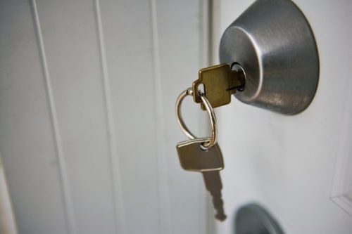 Key in lock in door clean disinfect every day your keys