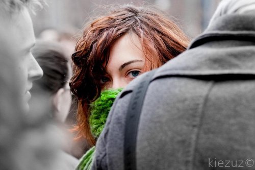 Woman hiding in the crowd