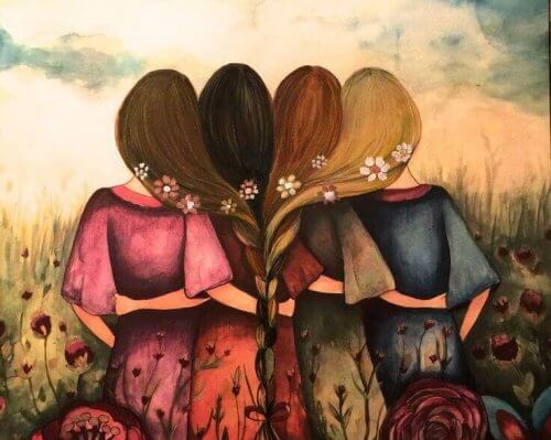 Four girls with their hair entwined.